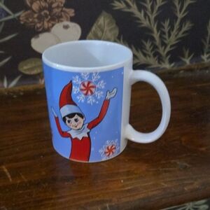 Festive Elf on the Shelf Ceramic Mug